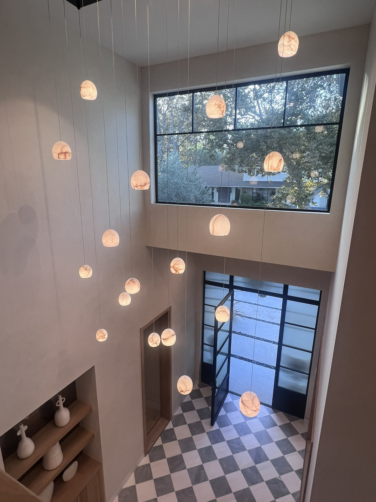 Inside a $25M Los Angeles Home: How Alabaster, Murano Glass & Rain Pendants Shape Luxury Lighting Design