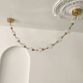 Strand Necklace Chandelier lighting by Bling Lighting Studio