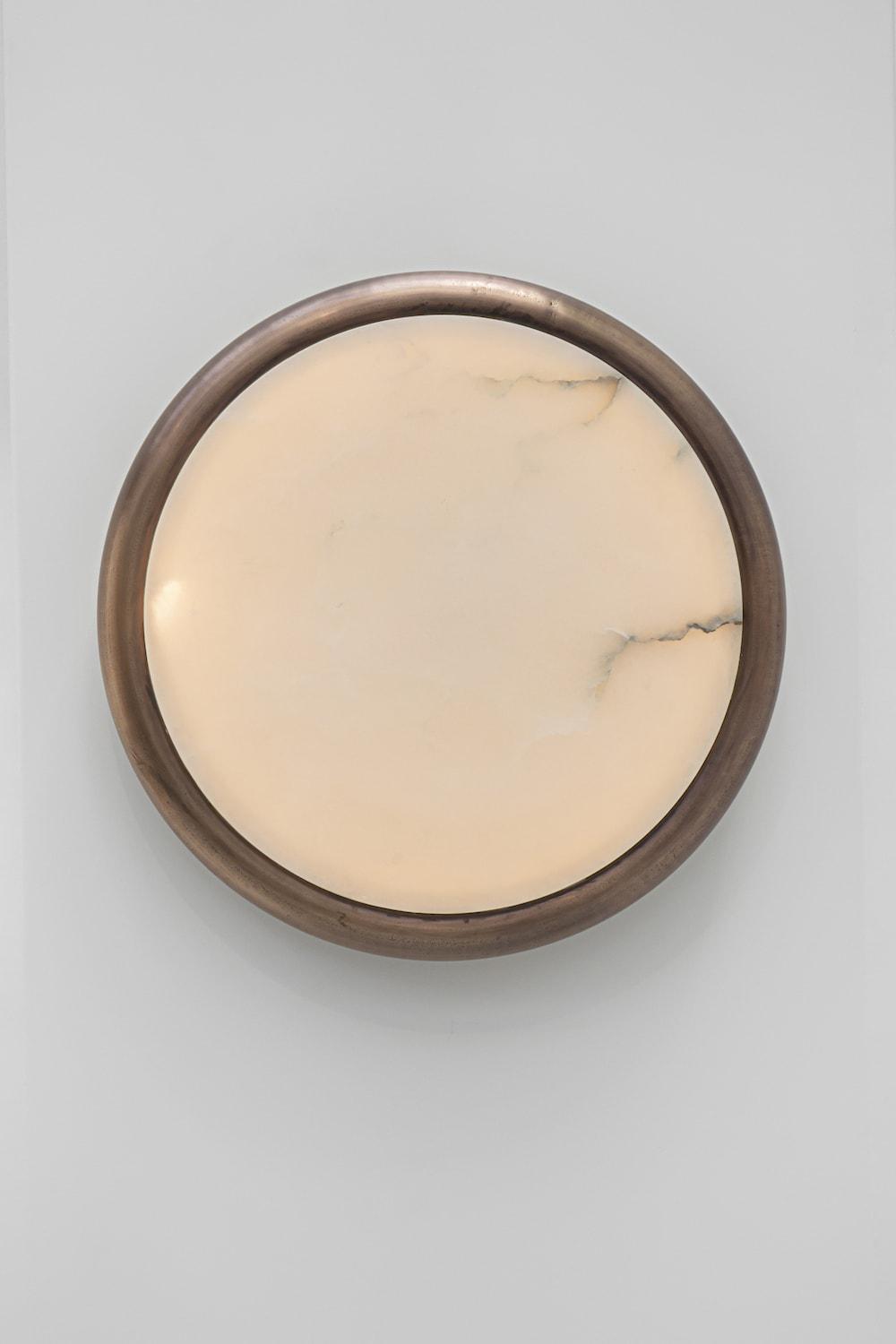 Moon alabaster wall sconce by Bling Lighting Studio