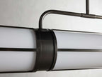 Remming 62" Linear Pendant in Bronze