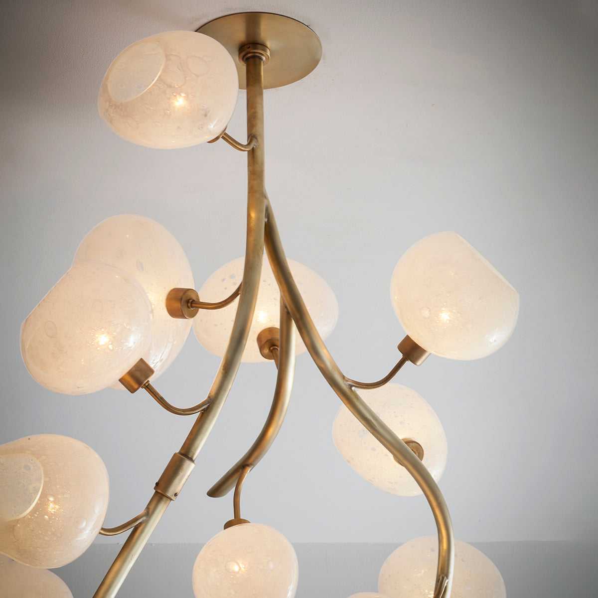 Modern Chandelier with Irregular Glass Lampshades and Brass Branches by Bling Lighting Studio