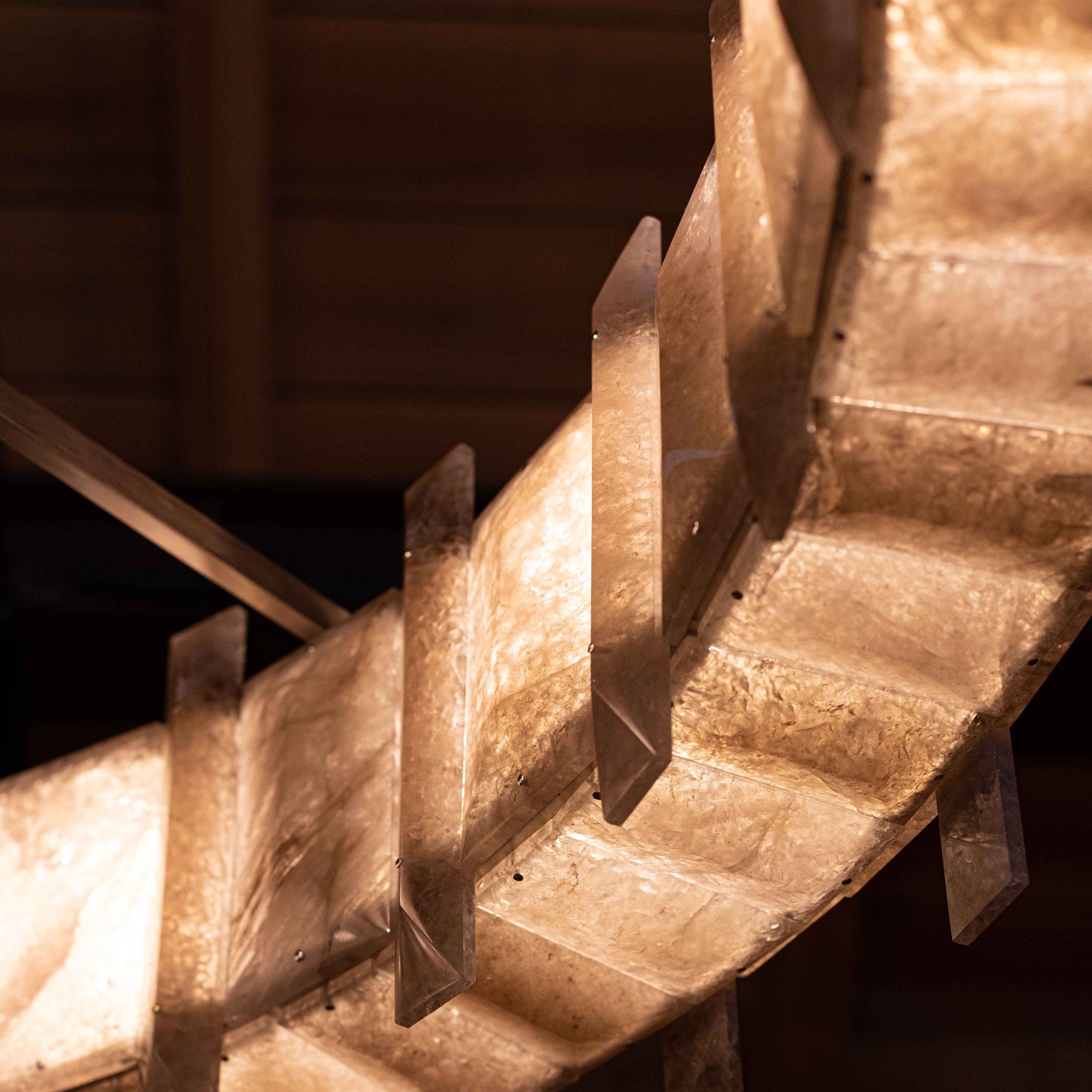 Saturn chandelier by Bling Lighting Studio